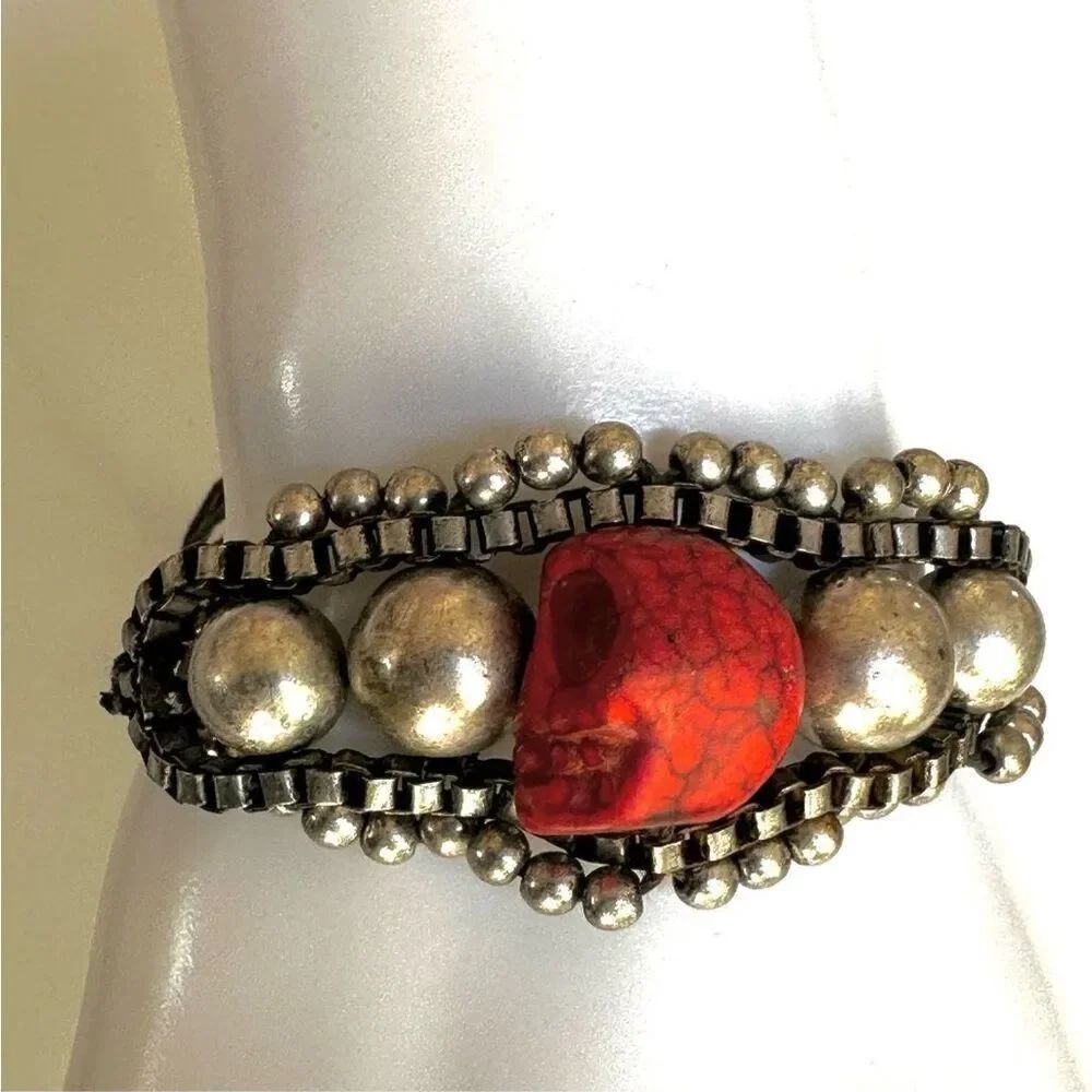Silver tone red skeleton black cord bracelet